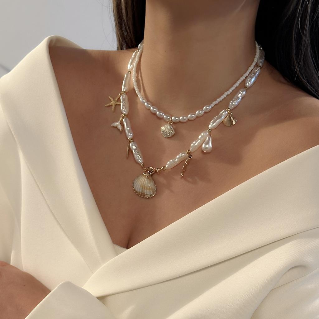 Vacation-style shell and starfish beaded multi-layered necklace, collarbone chain, beach vibe niche accessory