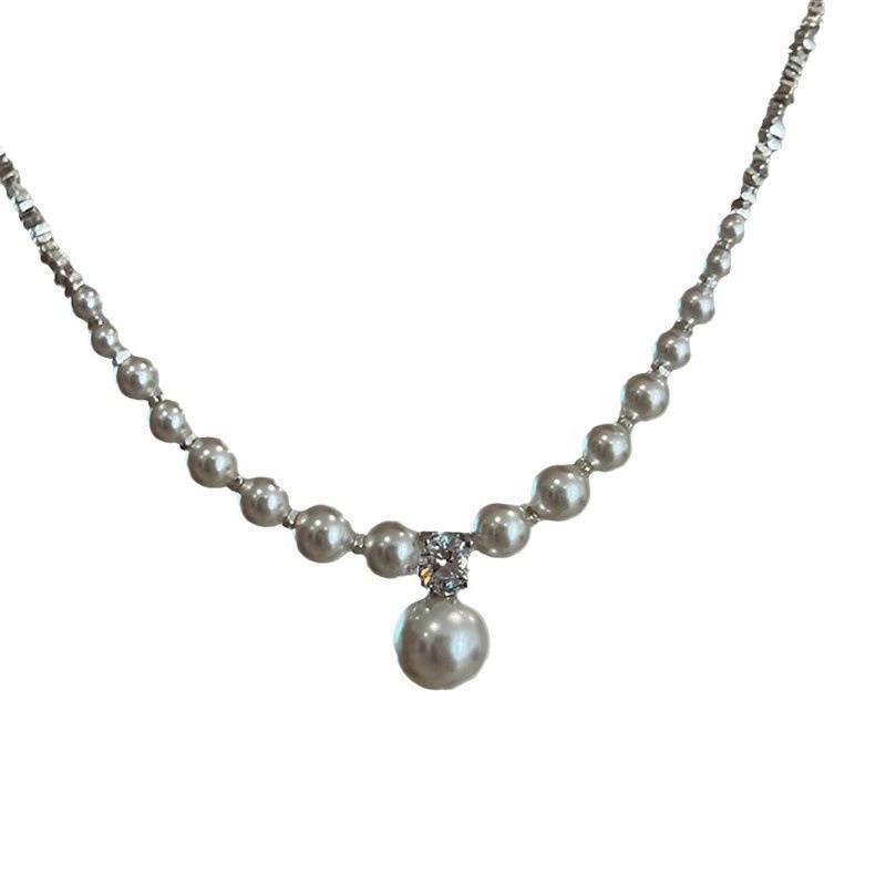 Pearl and Silver Pieces Pieced Together with Sparkling Diamonds - A Delicate Necklace for The Collarbone, A Charming Necklace for The Neck.
