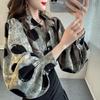 Blusa suelta con estampado de lunares y mangas farol, perfecta para cualquier ocasión