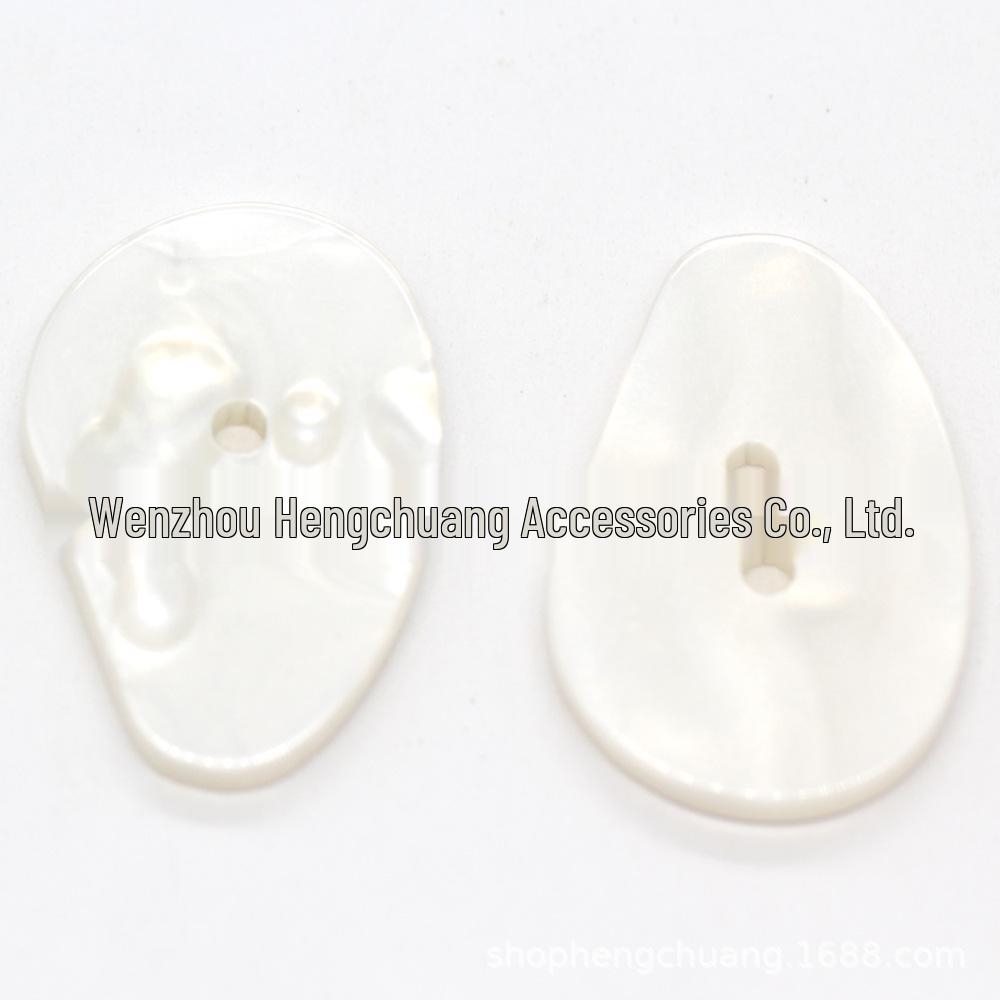 

Пальто Hengchuang из смолы с неровными пуговицами в два ряда и перламутровыми пуговицами