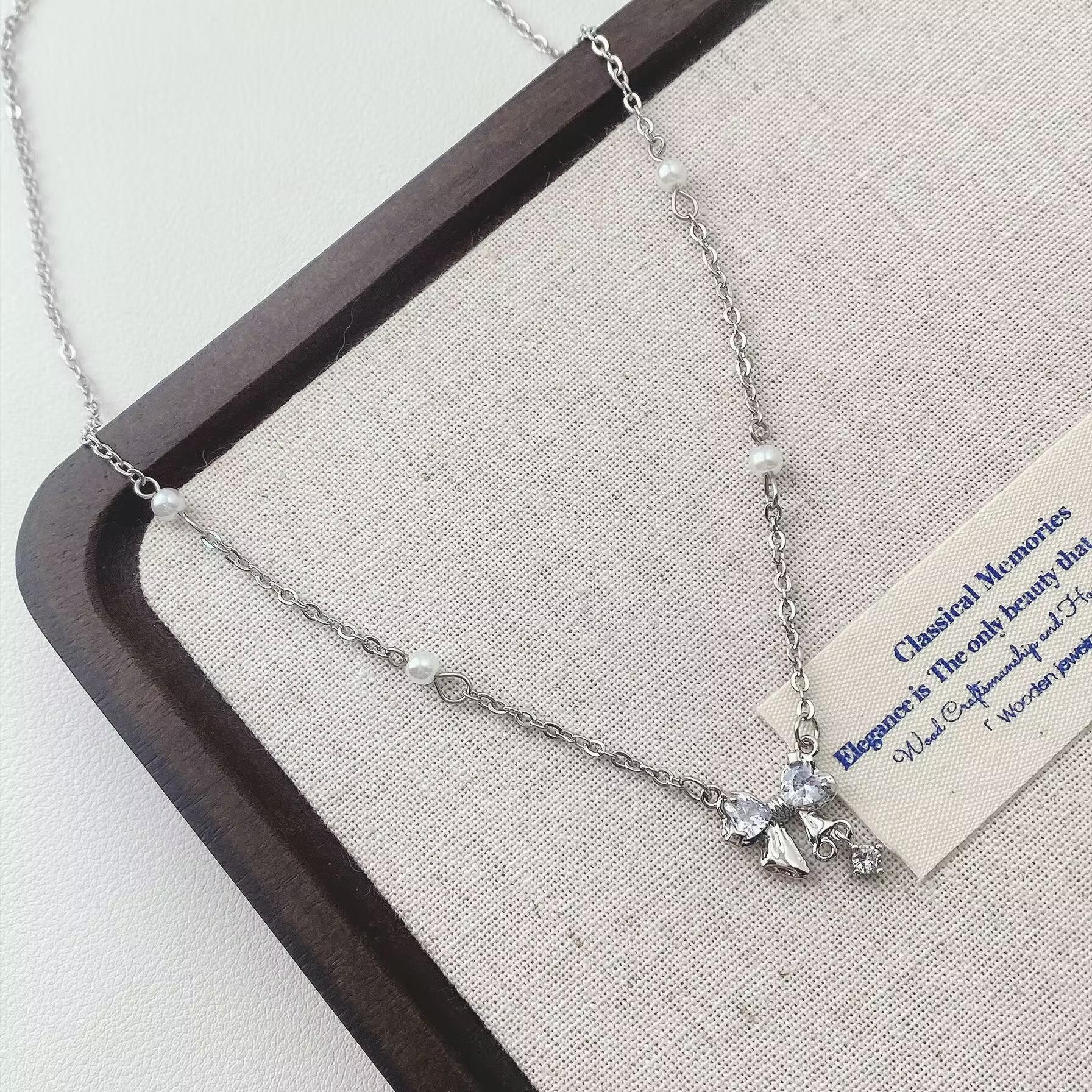Elegant Zircon Bow Pearl Necklace for Women - Versatile, Fashionable Clavicle Chain with a Niche Design