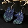 Vintage Cross Earrings: Two-Tone Carved Wolf Design