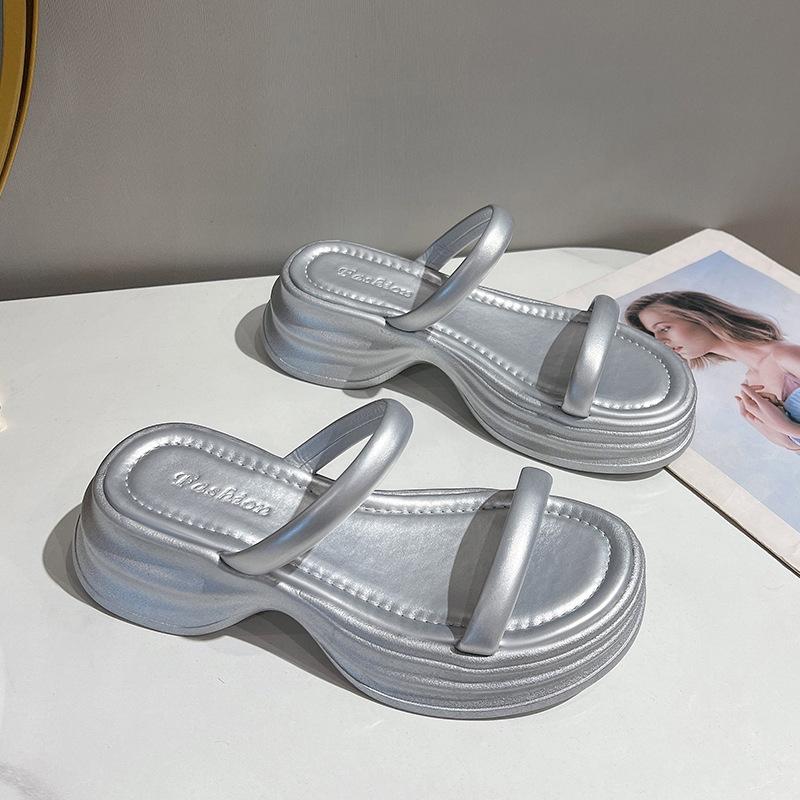 Fairy wind slippers female 2025 summer new muffin thick bottom word with fashion outside wear beach cool slippers