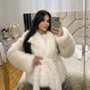 The new imitation fox fur coat is thin, fashionable medium and long, fluffy young environmentally friendly leather plush coat for women