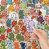 54 Q-Version Dinosaur Stickers - Creative, DIY, Waterproof, Ideal for Kids' Journals & Phones.