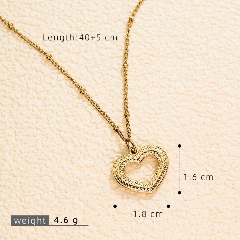 Stainless Steel Gold-Plated Love Heart Necklace with Inlaid Diamonds