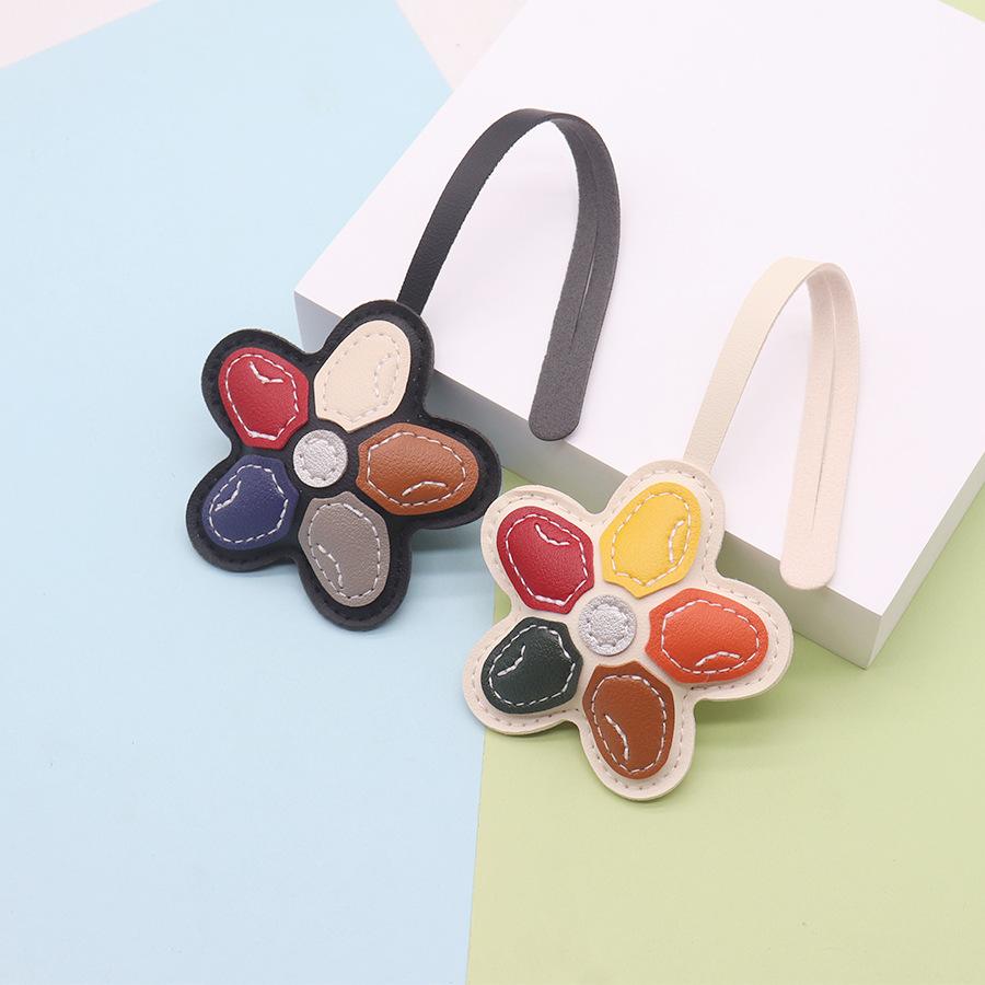 PU leather cute flower bag decorative charm fashionable simple new wave doll jewelry buckle head light luxury wind bag hanging