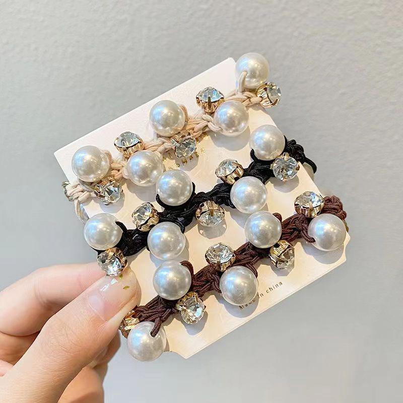 "Versatile Pearl Hairband: High-Elastic Luxury for Stylish Buns and Ponytails"