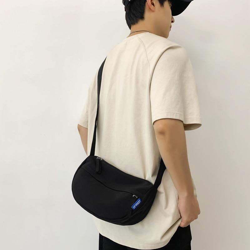 Large-capacity commuting leisure dumpling bag women's new simple and versatile shoulder messenger bag