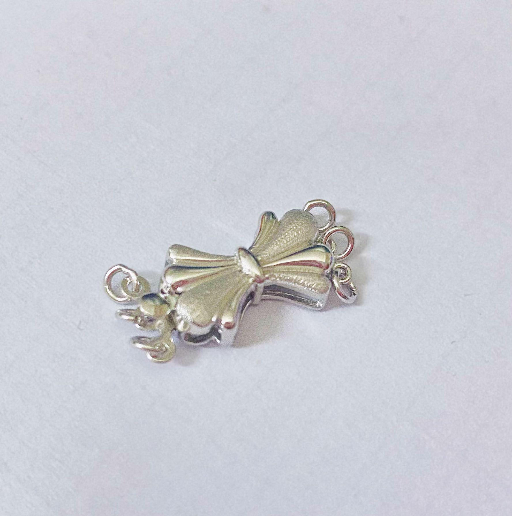 Sterling Silver Bow Necklace Pendant with Pearl Clasp