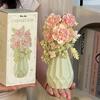 Decoração de casa – Flores e coroas artificiais