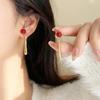 Retro Hong Kong Style Red Geometric Ear Clip Earrings for Women - Elegant Water Drop Long Chain, No Piercing Required.