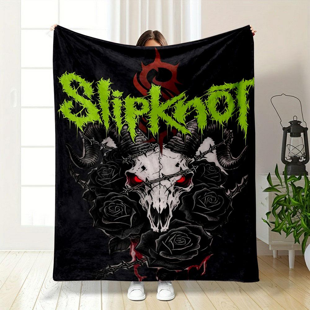 A demonic skull with horns, red eyes, black roses, and barbed wire. for all seasons blanket lunch break throw gift