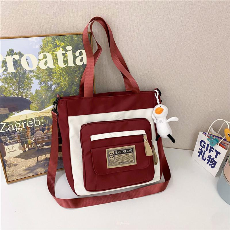 Canvas bag new large-capacity make-up bag dual-purpose tote bag women's schoolbag students junior high school high school canvas messenger bag