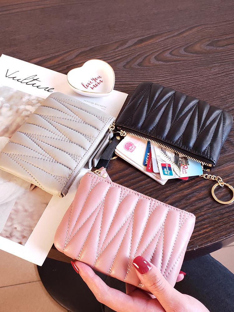 

Женский мини-кошелек из натуральной кожи на молнии - стиль 2025 розовый