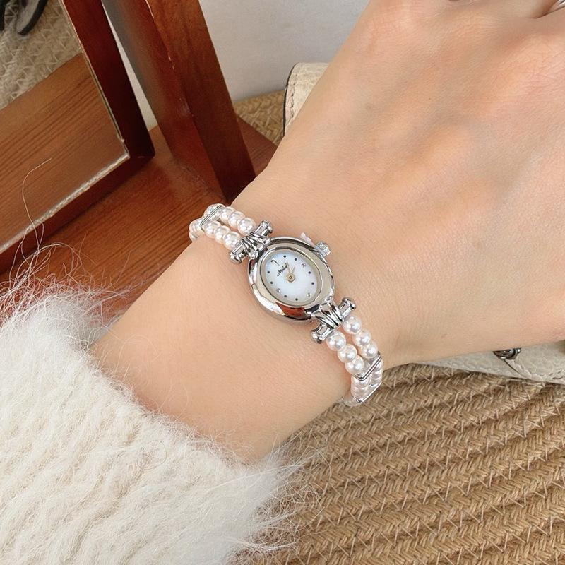 Neue Vintage kleine Goldene Uhr Luxuriös und Exquisit Runden Zifferblatt Premium Perlenarmband, Mode Damen Quarz Uhr