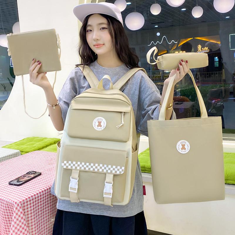 New Elementary School Student Schoolbag for Girls with Lightweight Large Capacity Junior High School Student Campus Backpack Four Piece Set