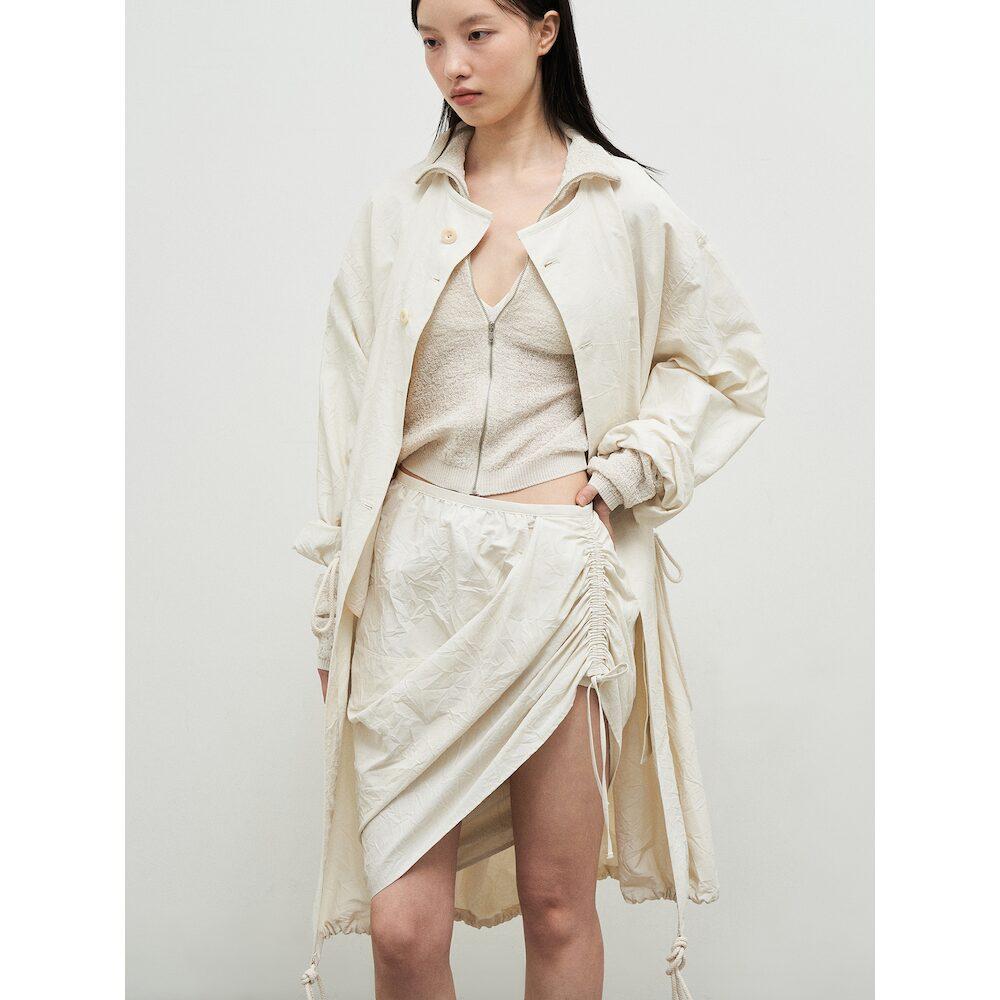 Anggae Wonderer Wrinkle String Mini Skirt Ivory