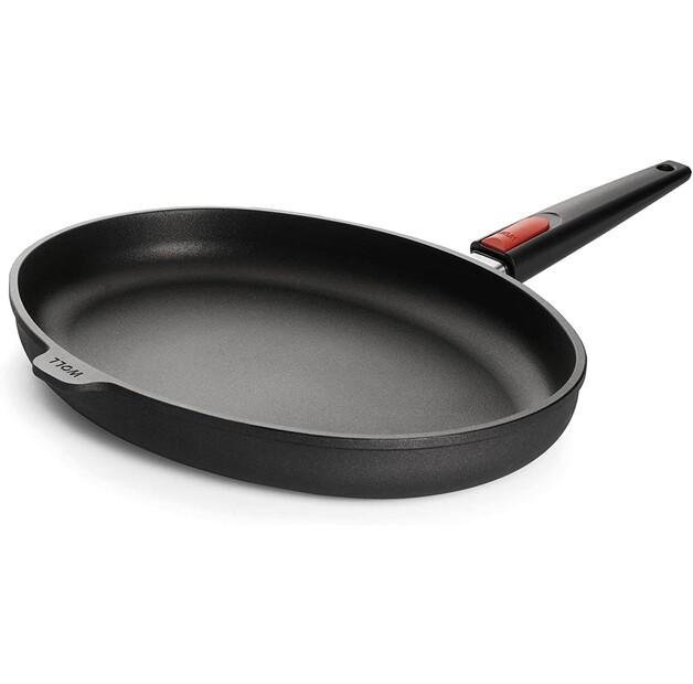 

Сковорода Woll nowo Titanium Induction чугунная для рыбы овальная 38x28 см со съемной ручкой (1538IL)