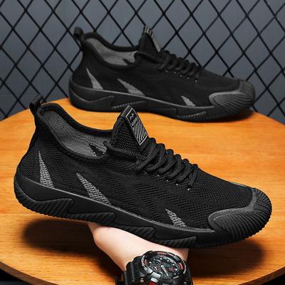 Printemps nouvelles chaussures pour hommes élastiques fly-woven respirantes maille noire chaussures de sport décontractées légères chaussures de course à une pédale