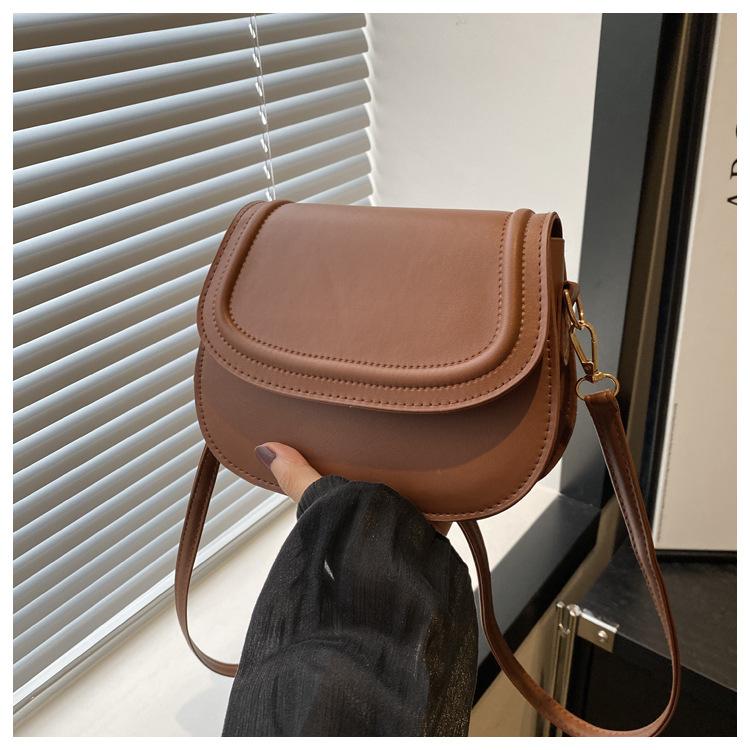 Taška Nová trendy retro sedlová taška, texturovaná messenger taška s nikaovým vzorem, jednoduchá a všestranná dámská taška přes rameno