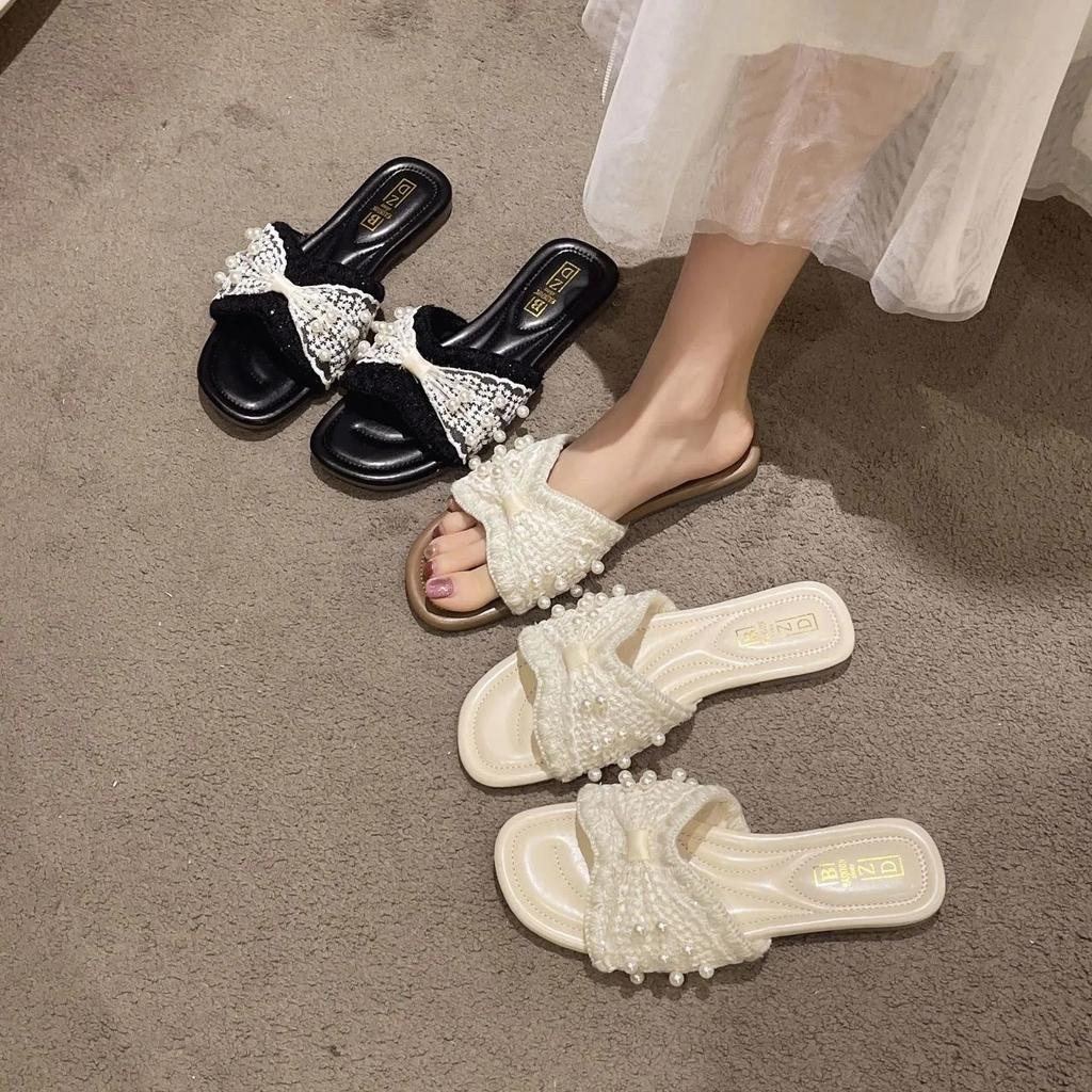 Französischer Feenstil einwortiger weiblicher Überbekleidung 2025 Sommer neu weicher Boden lässig vielseitig Mode Perle coole Slipper Tide