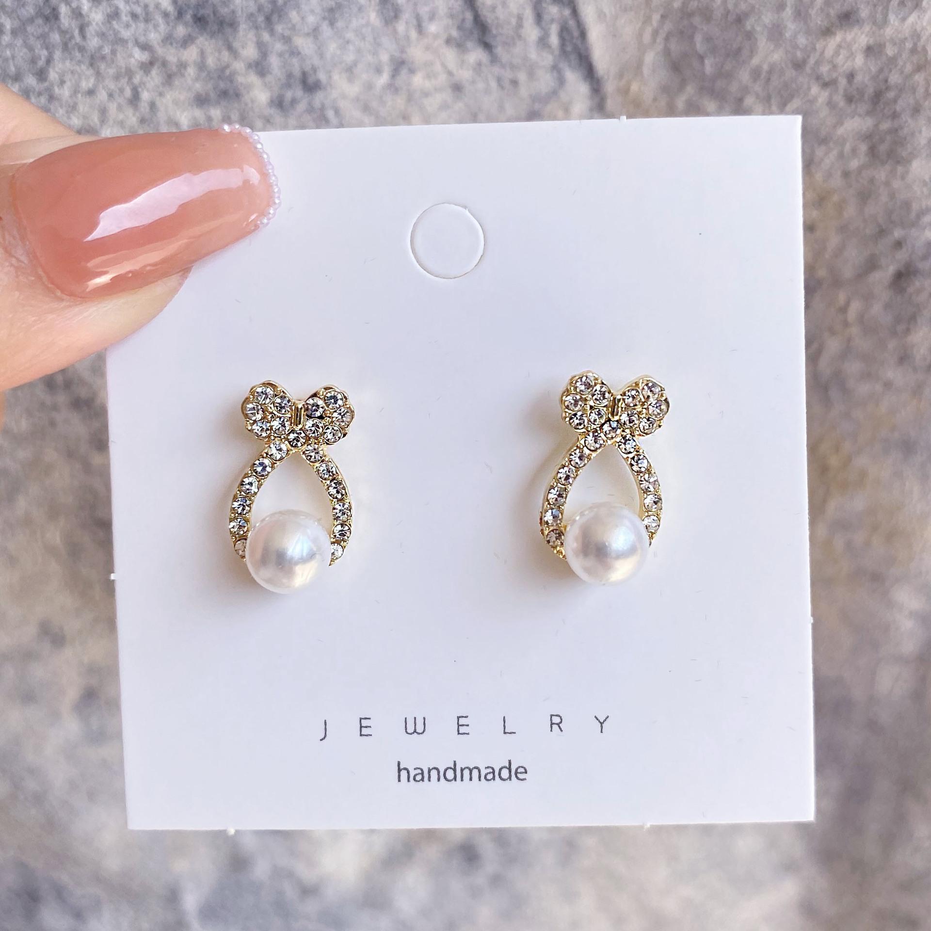 

Unique Exquisite Hollow Bowknot Crystal Imitation Pearl Stud Earring for Women Korean Geometry Zircon Christmas Girl Gift