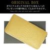 This gold long wallet for men and women is made from a single piece of genuine snakeskin leather. It features a round zipper, a coin purse, and card