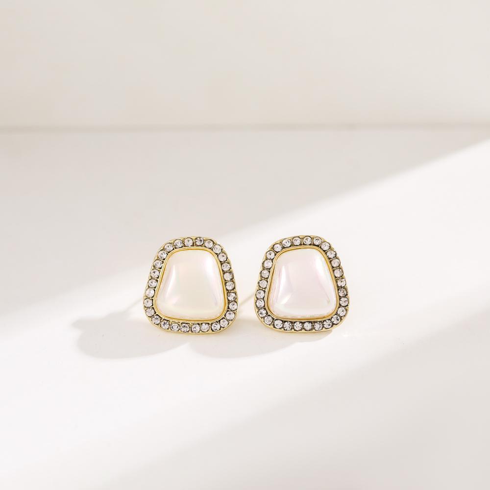 Boucles d'oreilles élégantes de couleur or pour femmes, tempérament blanc, boucles d'oreilles irrégulières, bijoux tendance, cadeaux