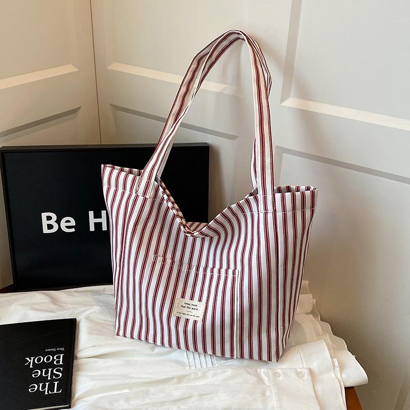 

Large capacity tote bag French striped canvas bag New summer versatile women s bag Light commuter shoulder bag красный