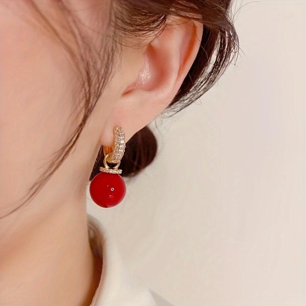 A Pair of New Earrings Paired with Luxurious and Fashionable Red Earrings