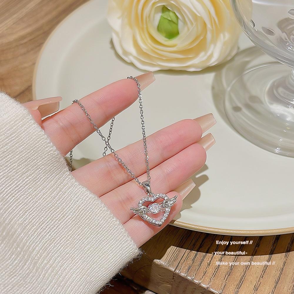 Smart angel necklace jewelry girl niche inlaid zircon love pendant light luxury exquisite titanium clavicle chain.