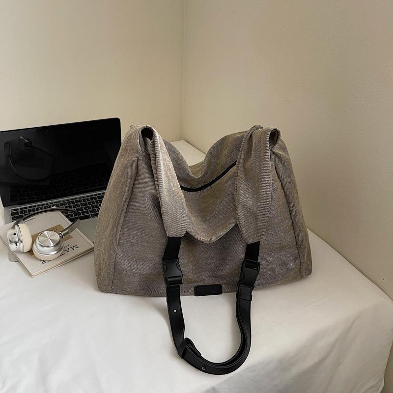 Japanese commuter canvas bag women's 2025 autumn new fashion simple trendy large-capacity college student shoulder tote bag