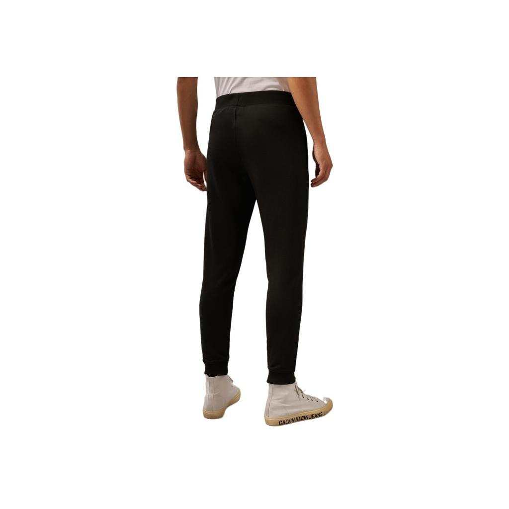 Calvin Klein Minimalist Letter Elastic Waistband Cuffed Casual Pants Knitted Sports Pants Men Bottoms Space-Black GMS4P634