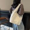 2025 jarní taška tote ležérní jednoduchá malá svěží módní taška přes rameno venkovní látková taška jednobarevná dámská