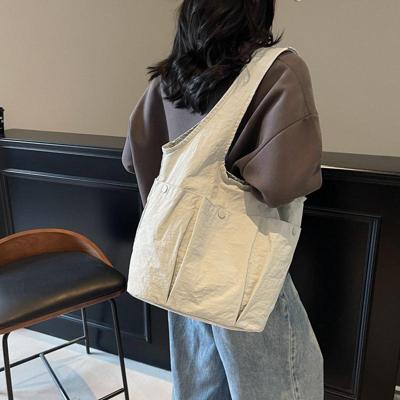 2025 spring tote bag casual simple small fresh fashion shoulder bag outdoor cloth bag solid color women