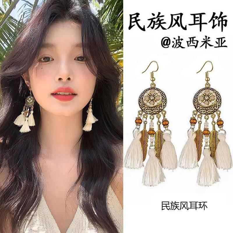 Bohemian ethnic style fringed earrings long niche woven feather earrings new travel wear earrings women