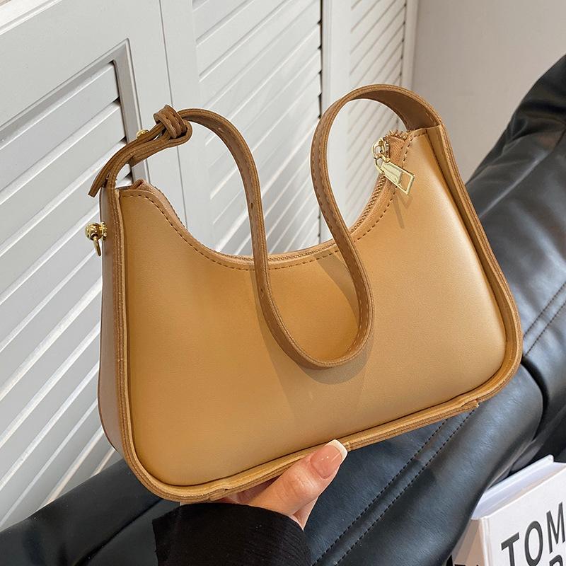 

Premium texture niche bag women s 2024 new summer versatile this year popular French white shoulder armpit bag хакі