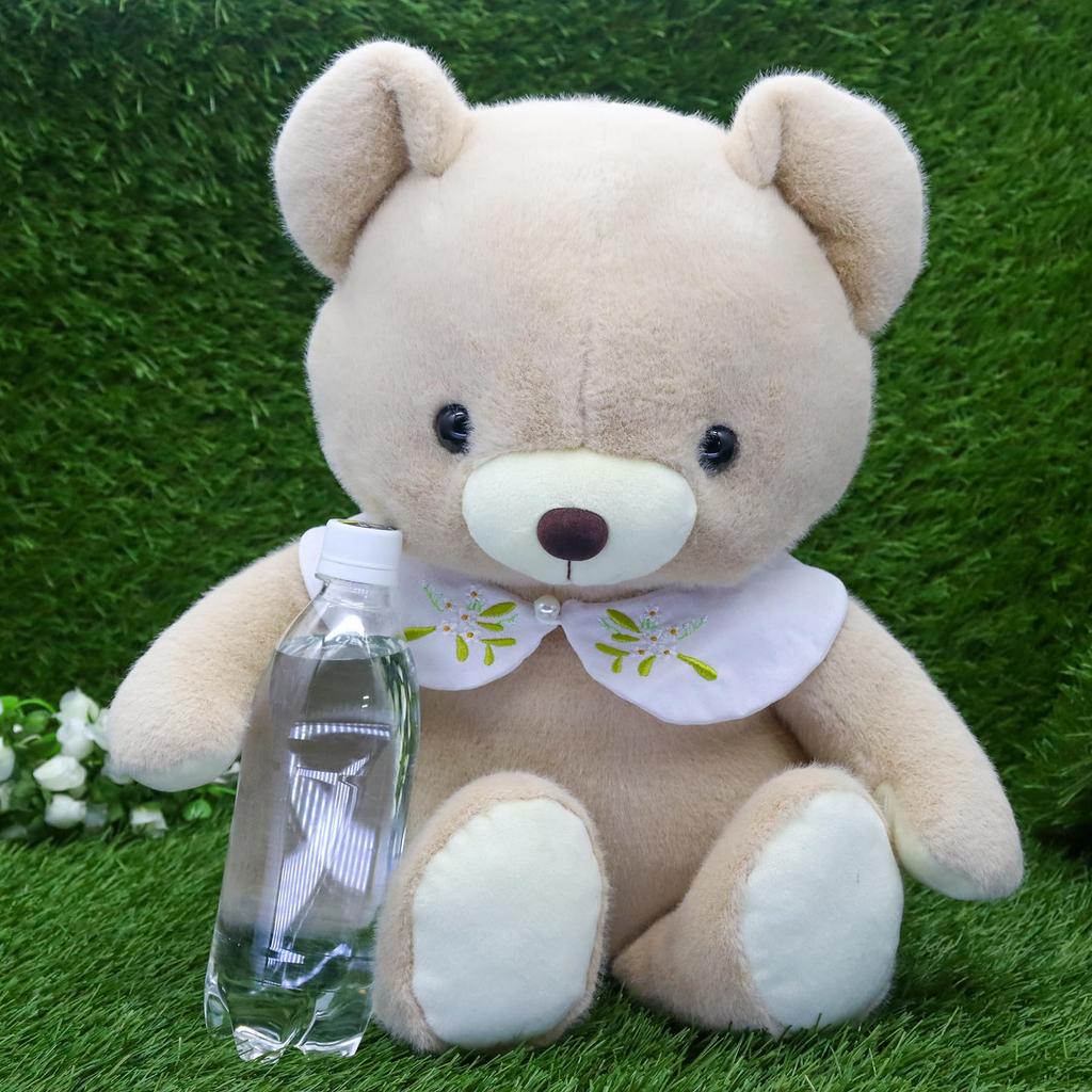 Take Off Bear Cub a retro bear with a cute floral embroidery on the beige plush toy with music Drop, pastel-colored collar. Large, box.