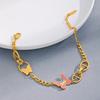 Cross-border explosion pink oil drop butterfly bracelet ins niche design high-end 18K gold stainless steel bracelet