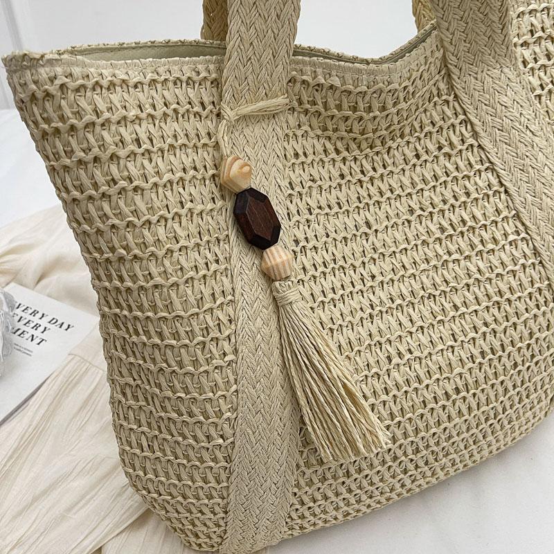 Handwoven Straw Tote Bag Women's Summer Beach Bag with Tassel Detail and Lightweight Design
