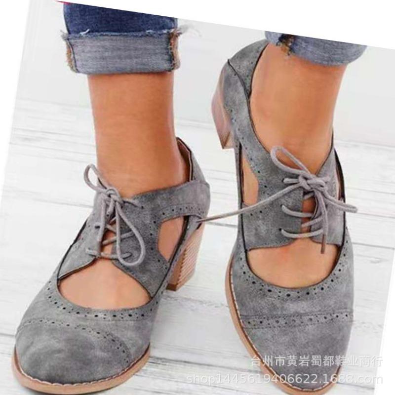 Spring and summer new thick heel high heel fashion single shoes women's large size lace-up hollow engraved women's shoes