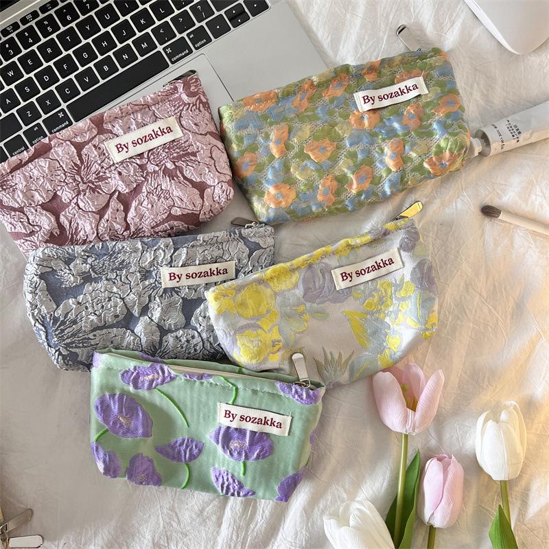 Trendy Ladies Simple And Portable Floral Embossed Cosmetic Bag For Use Everyday