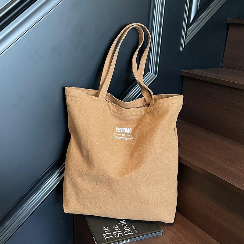 Canvas bag women's large-capacity new autumn and winter versatile shoulder bag casual college student class tote bag