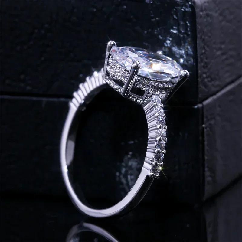 2026 Inlaid Oval Pigeon Egg Cube Zirconia Ring, Fashionable and Personalized Platinum Engagement High-quality Jewelry