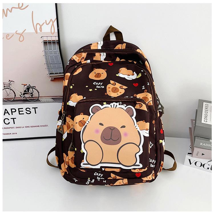 Schoolbag backpack new 1011 cartoon cute printing large capacity high value college style casual simple spine protection schoolbag
