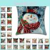 Housse de coussin de Noël festive avec un charmant motif bonhomme de neige et Père Noël pour une décoration intérieure chaleureuse