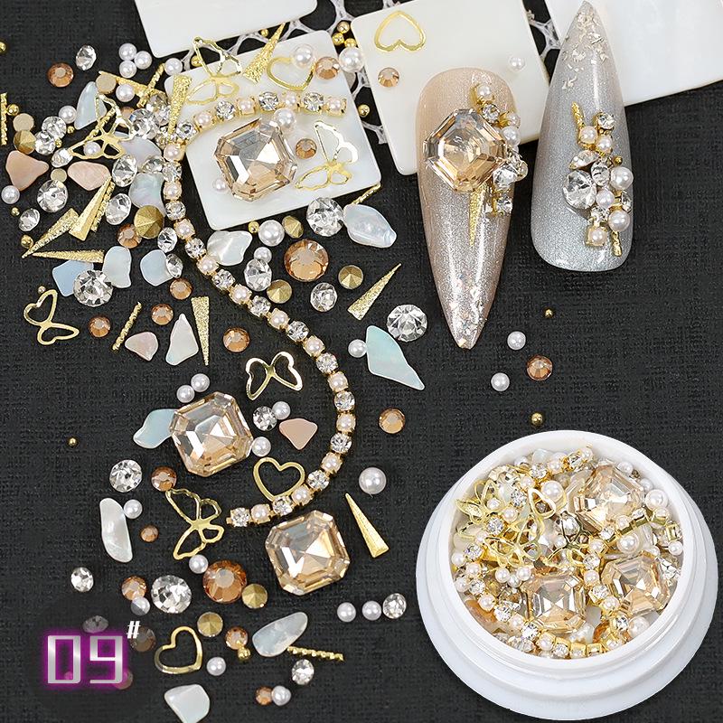 Dolphin Bay Nail Art: Shell Pieces, Rhinestones, Pearls, and Metal Chains Mixed Decorations