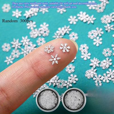 Approximately 300pcs Mini Metal Snowflake Embellishments, 0.2" White Craft Snowflakes for Holiday Crafts and Party Favors