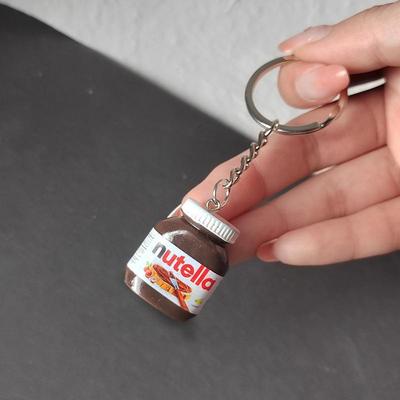 2 Stück Kreative Simulation Haselnuss Schokolade Marmeladenglas Flasche Schlüsselanhänger Paar Schlüsselanhänger Taschenanhänger Auto Schlüsselhalter Geschenke
